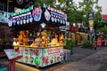 Urban refreshments: A street cart offering fruit and drinks, surrounded by vibrant urban Royalty Free Stock Photo