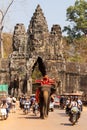 Elephant and other traffic exiting the south gate of Angkor Thom