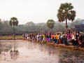 Siem Reap, Cambodia 2014Jan - Travellers and tourists waiting for sunrise, in front of lily pond, to take photos of the famous Royalty Free Stock Photo