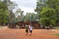 Siem Reap, Cambodia - 29 March 2018: tourist in angkorian temple Banteay Srei. Couple on temple entrance.