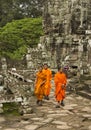 Siem Riep, Cambodia - Oct 9, 2011: Three monks walking