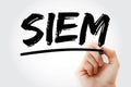 SIEM - Security Information and Event Management acronym with marker, business concept background