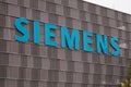 Siemens sign hanging on a building in Zug, Switzerland