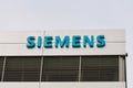 Siemens sign hanging on a building in Zug