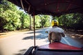 SIEMREAP - JUNE 10, 2015: An unidentified tuktuk driver entering