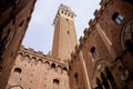 Siena City Hall. View from Palazzo Pubblico courtyard with the imposing tower Torre del Mangia, Siena, Tuscany, Italy Royalty Free Stock Photo