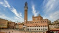 Siena clock tower in Siena square Basilica Cateriniana di San Domenico