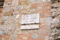 Traditional marble street sign in the historical city of Siena, Tuscany, Italy