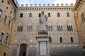 SIENA, ITALY - JUNE 22, 2022: Palazzo Salimbeni, the Main Office or Headquarter of Monte dei Paschi Bank, with Statue of Sallustio