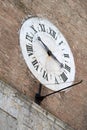 Siena, Italy. Old clock on the wall Royalty Free Stock Photo