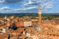 Siena, Italy rooftop city panorama. Mangia Tower, Italian Torre del Mangia Royalty Free Stock Photo