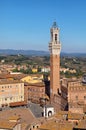 Siena, Italy. Torre del Mangia - famous bell tower located on the city`s premier square