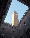 Siena, SI, Italy - February 20, 2023: Mangia Tower view from the Town Hall