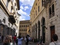 Siena, 25th august : Tourists walking on narrow street of Siena Medieval City. Tuscany. Italy