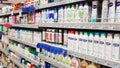 Supermarket shelves with products for personal hygiene: deodorants, perfumes, soap