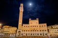 Siena, Tuscany, Italy: the town hall Palazzo Pubblico in Piazza del Campo Royalty Free Stock Photo