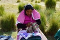 Sierra Chincua, Michoacan, Mexico, January 14: Indigenous woman sews clothes