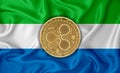 Sierra Leone flag, ripple gold coin on flag background. The concept of blockchain, bitcoin, currency decentralization in the