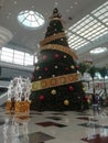 sierra nevada shopping centre, granada spain - december 22 2021: gigantic christmas tree at the entrance of the shopping