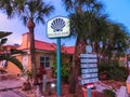 Siesta Key, USA - May 11, 2018: The road welcome sign with beach hotel at Siesta Key at Florida, USA