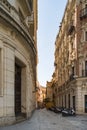 Siesta time. The narrow street with cafe and motobike parking. Seville, south of Spain