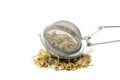 Sieve with dried chamomile isolated on background Royalty Free Stock Photo
