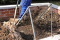 Sieving the composted earth Royalty Free Stock Photo