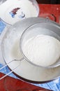 Sieving flour Royalty Free Stock Photo