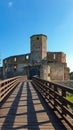 Siewierz - The ruins of Castle of Bishops in Siewierz, Poland. There is a wooden bridge leading to the castle Royalty Free Stock Photo