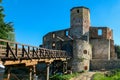 Siewierz - The ruins of Castle of Bishops in Siewierz, Poland. There is a wooden bridge leading to the castle Royalty Free Stock Photo