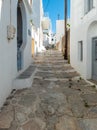 Sifnos island, Apollonia village Cyclades Greece. Buildings empty alley and stairs. Vertical Royalty Free Stock Photo