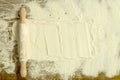 Sifted flour and rolling pin on the table Royalty Free Stock Photo