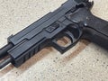 Sig Sauer P226 replica handgun cocked