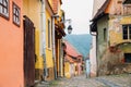 Sighisoara old town street colorful houses in Romania Royalty Free Stock Photo