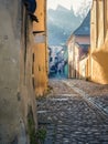 Colorful scene from the cobblestone streets of Sighisoara Fortress