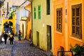 Sighisoara, Romania, May 13, 2019: Beautiful colorful street in Sighisoara in typical traditional style. Old houses are preserved Royalty Free Stock Photo