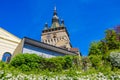 Sighisoara, Romania, May 13, 2019: Dracula`s house and the clock tower , historic centre of Sighisoara, Transylvania region in Royalty Free Stock Photo