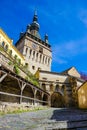 Sighisoara, Romania, May 11, 2019: Famous medieval fortified city and the Clock Tower built by Saxons