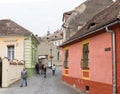 Monastery street in the castle of old city. Sighisoara city in Romania Royalty Free Stock Photo