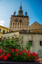 Sighisoara, Romania: Old building in Sighisoara citadel. Tower Clock in Sighisoara Royalty Free Stock Photo