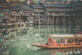 Sighseeing boat with tourists in Fenghuang