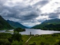 scotland loch with monument near the sea