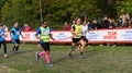 Sightless man with his escorts crosses the finish line in the race, TCS Lidingoloppet Royalty Free Stock Photo