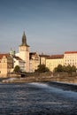 Sights Of Prague. Chapel and waterfront European city. Facades of vintage buildings