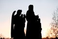 Sights of Prague, Czech Republic. Beautiful landscape silhouettes of sculptures against sky. Sunset backlit silhouettes of statues