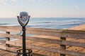 Sightseeing Binoculars on Pier and Beach Royalty Free Stock Photo