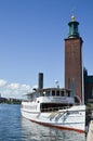 Sightseeing boat by the City Hall in Stockholm Royalty Free Stock Photo