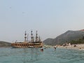 Sightseeing boats on the shores of the Mediterranean Sea. Large sailing boats for excursions. Excursion on a pirate ship by sea. Royalty Free Stock Photo