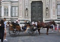 Sightseeing Carriage front of Battistero from Piazza Giovanni Square of FLorence City. Italy