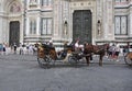 Sightseeing Carriage front of Battistero from Piazza Giovanni Square of FLorence City. Italy